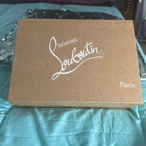 Never worn Christian louboutin black leather heels. Perfect red bottom